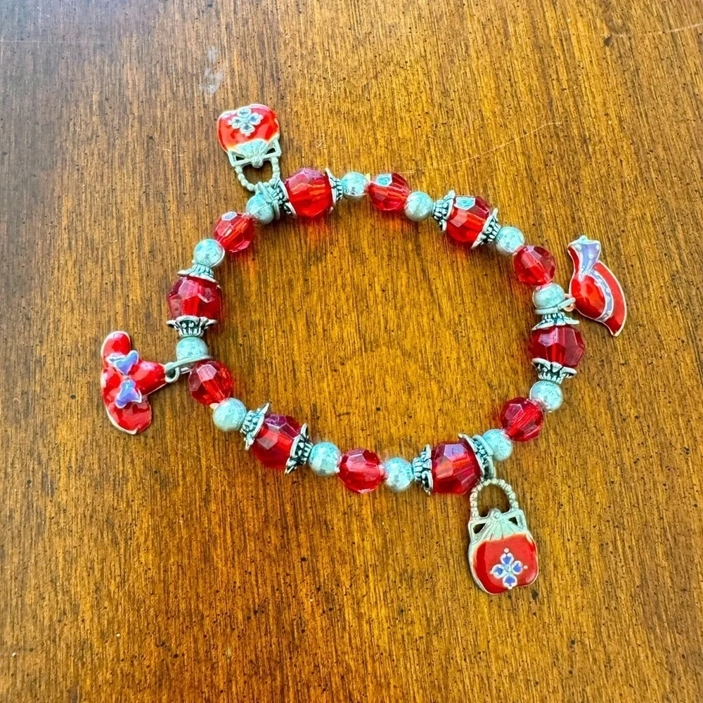 Red and silver charm bracelet